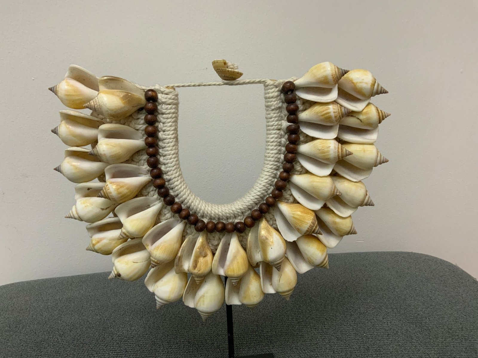 The Terra Conch & Wood Bead Statement Necklace on Stand